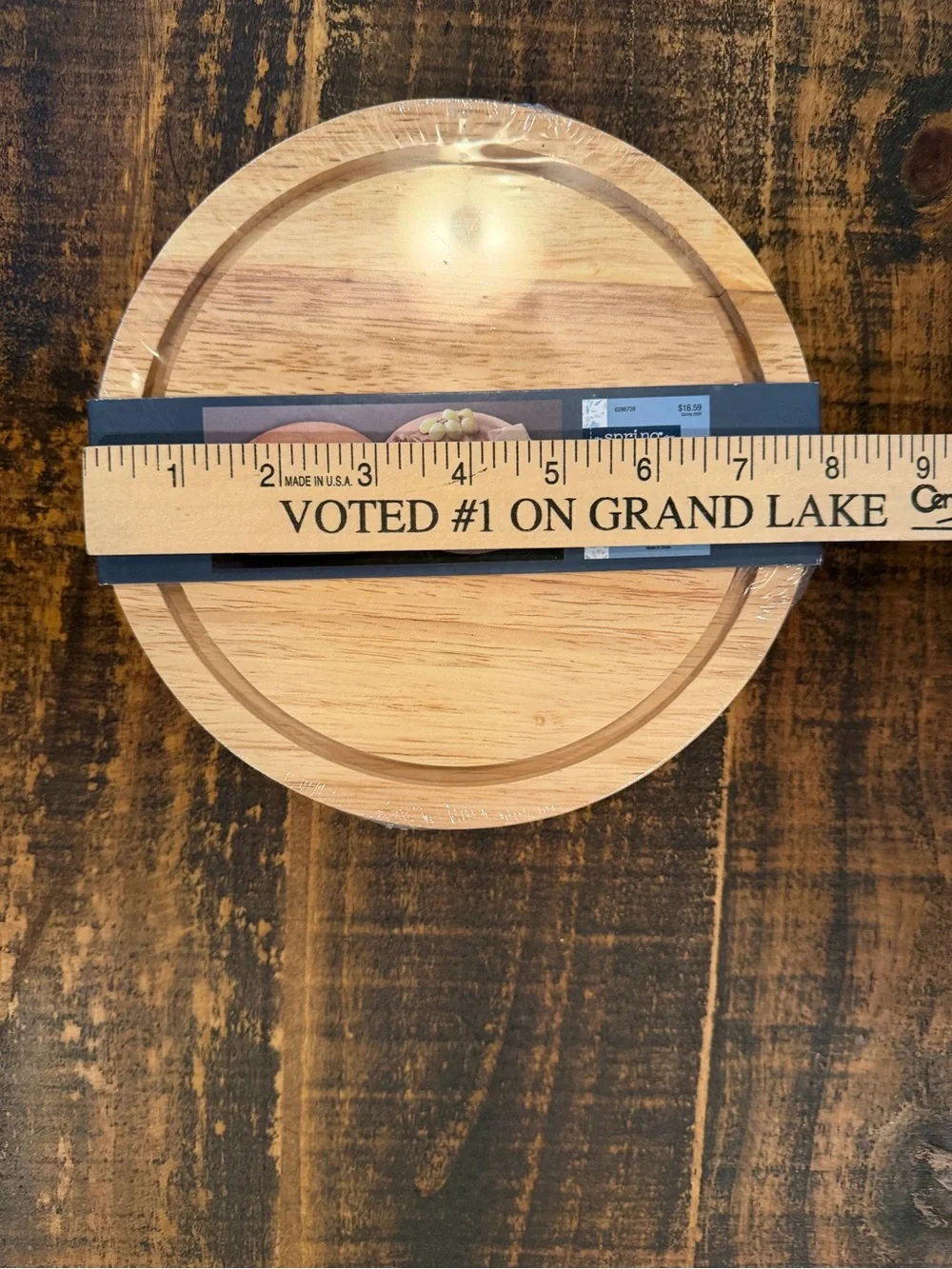 Round Bamboo Serving Board that opens with Utensils inside.